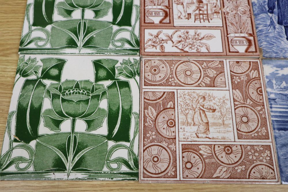 A collection of 19th/early 20th century transfer-printed and moulded wall tiles,